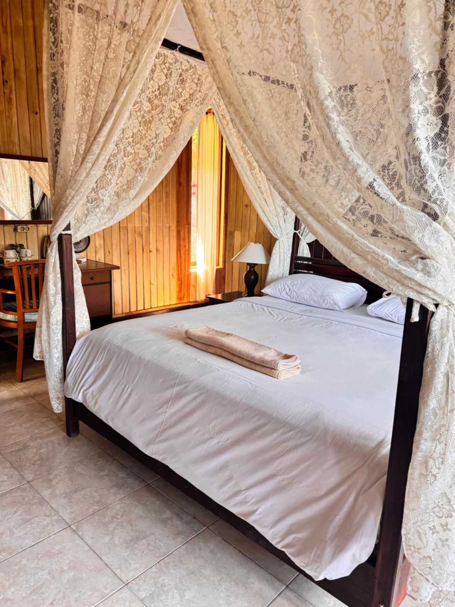 Puri Alam Bali Hotel มุนดุก ภายนอก รูปภาพ