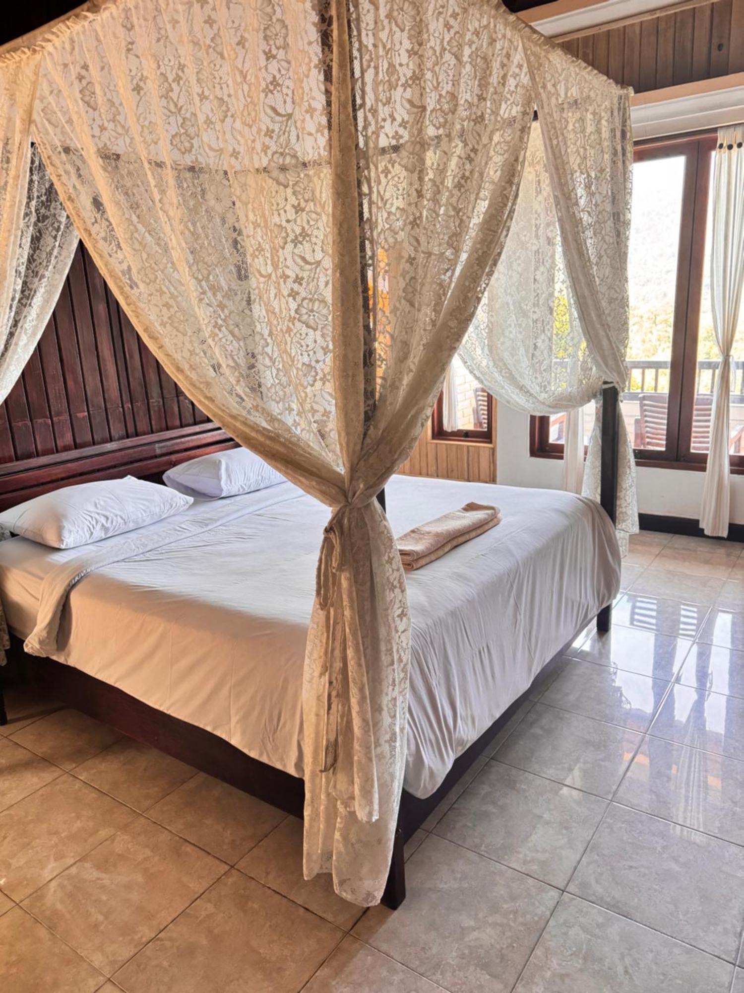 Puri Alam Bali Hotel มุนดุก ภายนอก รูปภาพ